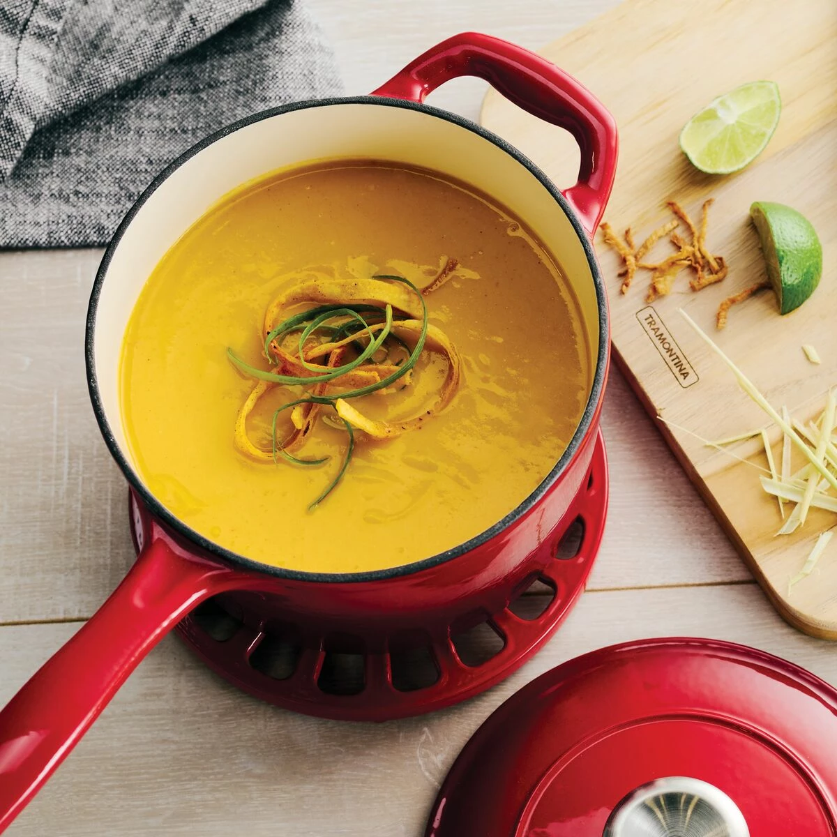 Tramontina 2.5 Qt Enameled Cast-Iron Series 1000 Covered Sauce Pan - Gradated Red 1 Tramontina 2.5 Qt Enameled Cast-Iron Series 1000 Covered Sauce Pan - Gradated Red